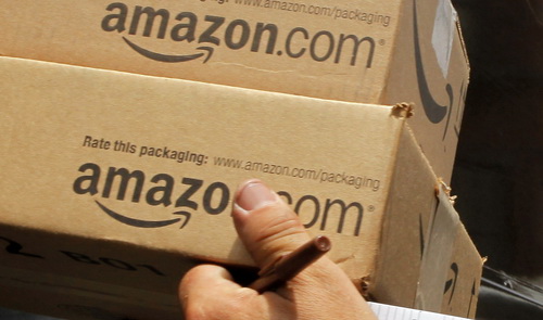 Amazon.com beats expectations despite profit fall