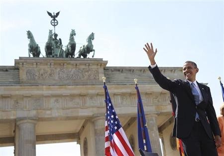 Obama defends intelligence tactics in wary Berlin