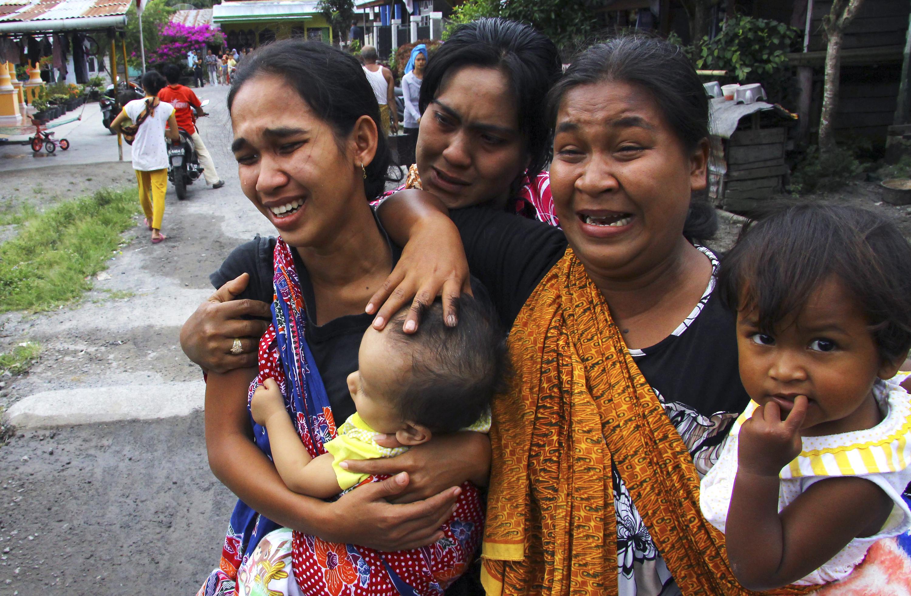 Scramble to reach Indonesia quake survivors as toll hits 22