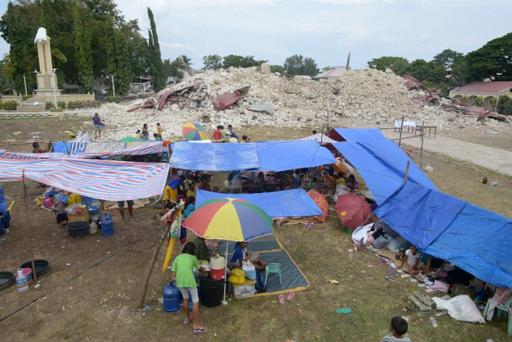 Hopeless search as Philippine quake death toll hits 151
