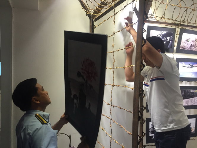 Ho Chi Minh City authorities confiscate wartime photos featuring guns replaced by flowers