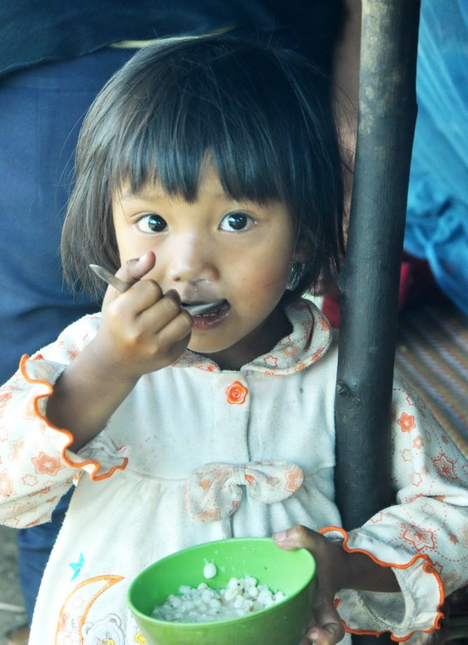 A child is pictured having lunch, which only includes 