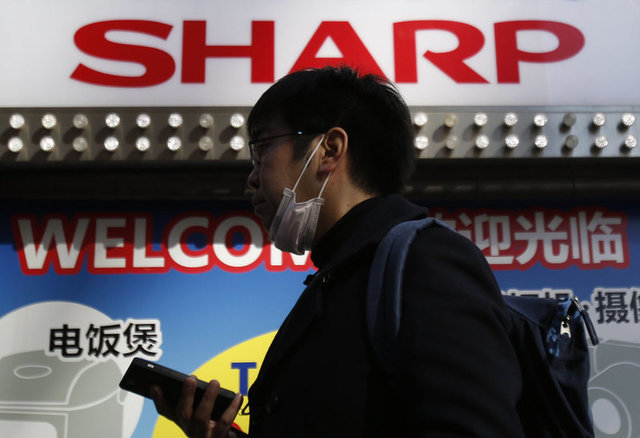 Red faces, raised voices over late hitch in Foxconn's Sharp deal