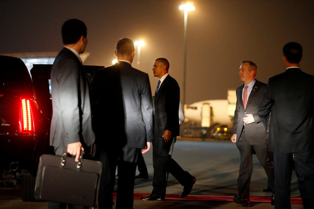 U.S. President Barack Obama walks to his limousine as he arrives at Noibai International Airport in Hanoi, Vietnam May 22, 2016.