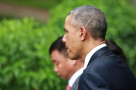 U.S. President Barack Obama is captured in this photo walking to the former residence of late Vietnamese President Ho Chi Minh in Ba Dinh District, Hanoi on May 23, 2016.
