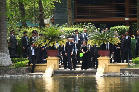 U.S. President Barack Obama and Chairwoman of Vietnam’s National Assembly Nguyen Thi Kim Ngan feed the fish in a pond near the former residence of late Vietnamese President Ho Chi Minh in Ba Dinh District, Hanoi on May 23, 2016.