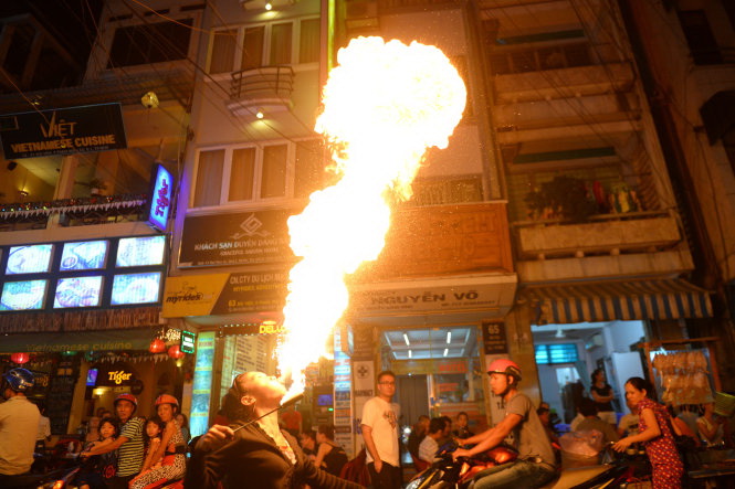 Vietnamese women, teen girls breathe fire for living at expense of own health