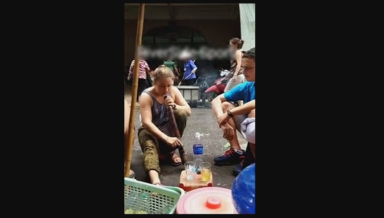 Foreign woman knocked out by Vietnamese wild tobacco (video)