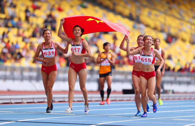 Vietnam's woman's 4x100m relay team celebrate