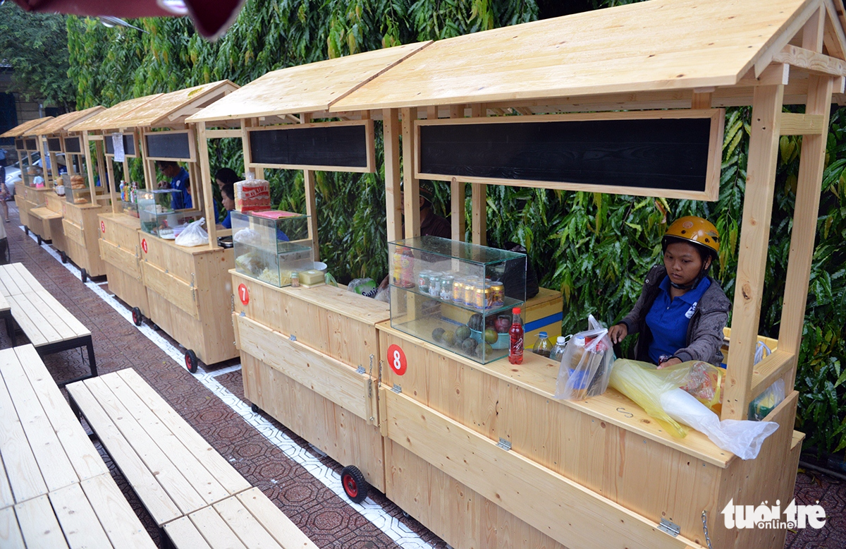 Wooden stalls are used at the Bach Diep Tung food street in District 1, Ho Chi Minh City. Photo: Tuoi Tre