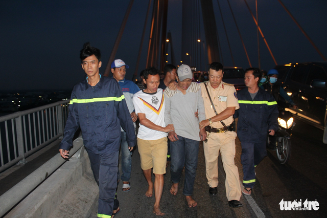 Man allegedly high on drugs performs stunts along bridge in Vietnam’s Mekong Delta