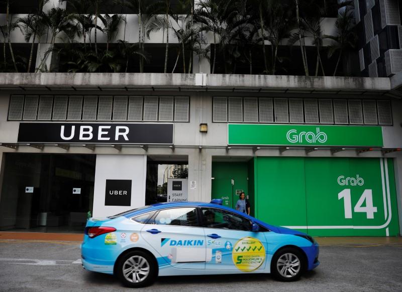 Uber agrees to sell Southeast Asia business to Grab after costly battle