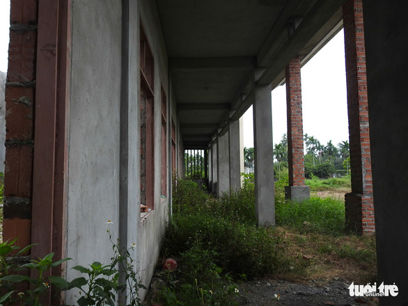 Weeds grow around the building, seen in rural Hai Phong City, northern Vietnam. Photo: Tuoi Tre