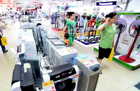 Shoppers inside a Nguyen Kim electronics store in Ho Chi Minh City. Photo: Tuoi Tre