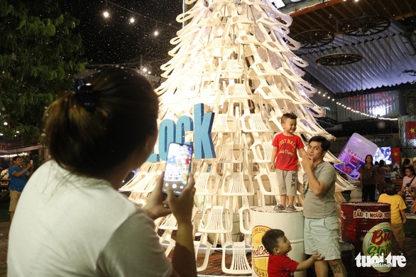 The 8-meter Christmas tree made up of 200 plastic chairs is seen at the Rubik Zoo in Ho Chi Minh City. Photo: Tuoi Tre