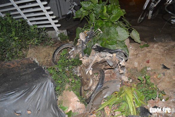 A motorbike is seen after being hit by the taxi in an accident that killed three in Lam Dong Province, Vietnam’s Central Highlands, January 1, 2018. Photo: Tuoi Tre