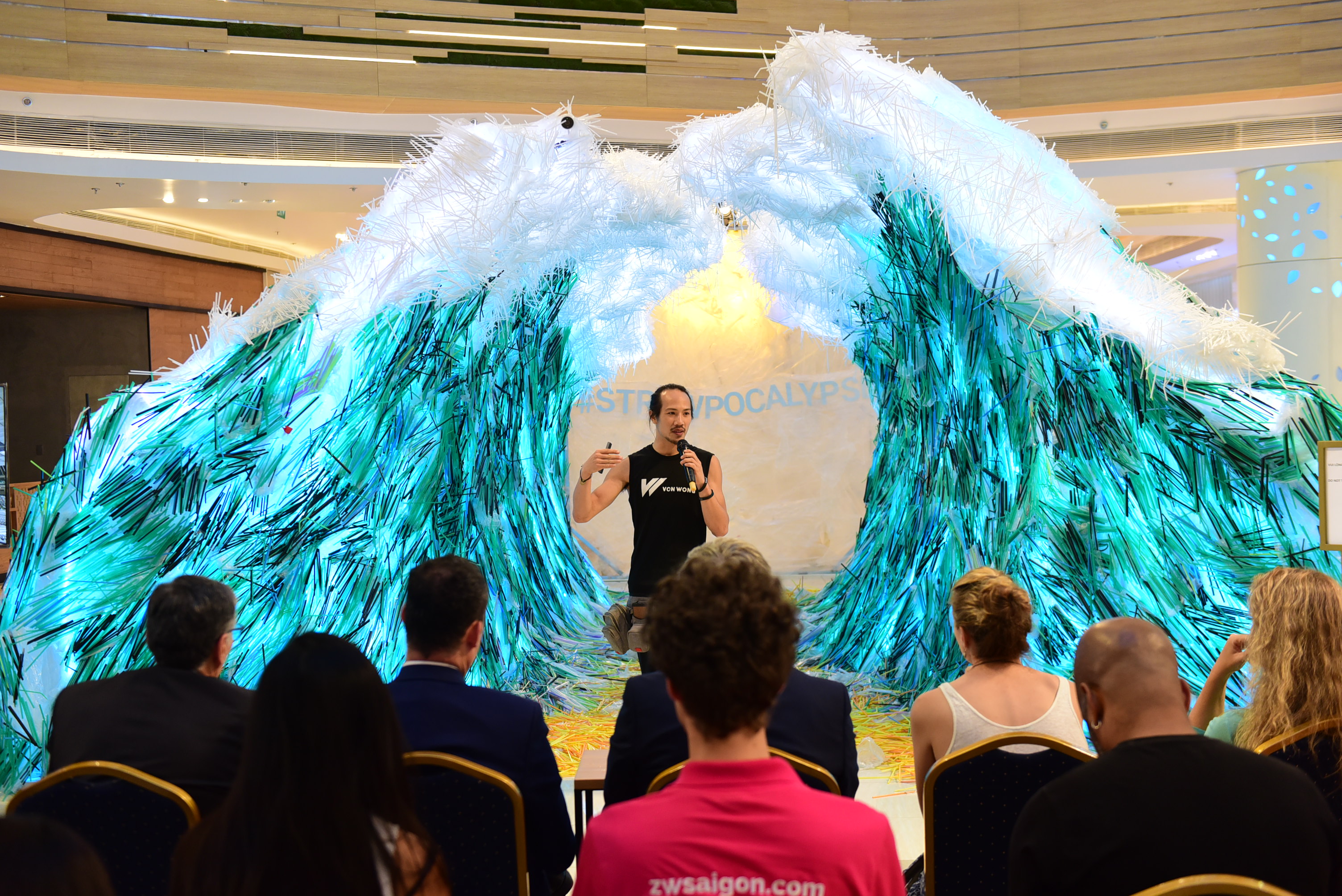 Von Wong speaks to guests at the launching ceremony of The Parting of The Plastic Sea in Ho Chi Minh City on January 25, 2019. Photo: Quang Dinh/Tuoi Tre