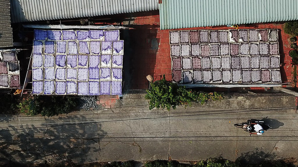 An aerial view of rice flour sun-dried on wooden frames at the Sa Dec Flour Village in Dong Thap Province, southwestern Vietnam. Photo: C. Quoc, D. Phan & T. Nhon / Tuoi Tre