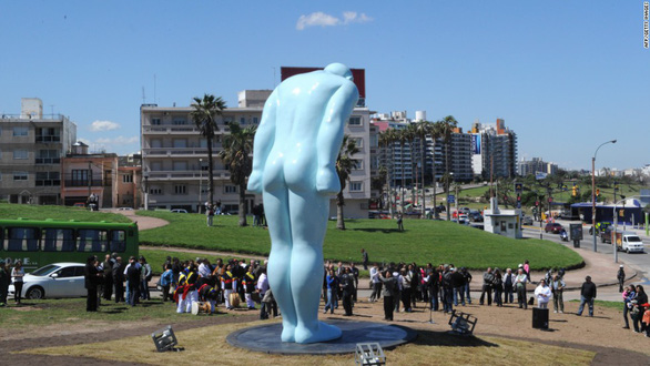 A Greeting Man statue is placed in the neighborhood of Buceo, Montevideo, Uruguay. Photo: CNN