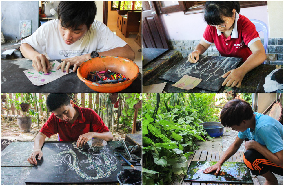 Members of Peaceful Bamboo Family at different stages of painting the pictures. Photo: Tien Vu / Tuoi Tre