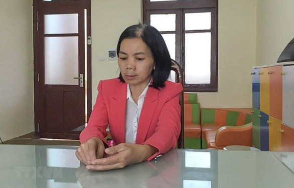 Bui Thi Kim Thu, accused of covering up Duyen’s murder, is seen at a police station in Dien Bien Province after her arrest. Photo: Vietnam News Agency