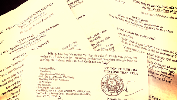 Documents regarding the overseas trips of officials at the government inspectorate. Photo: Than Hoang / Tuoi Tre