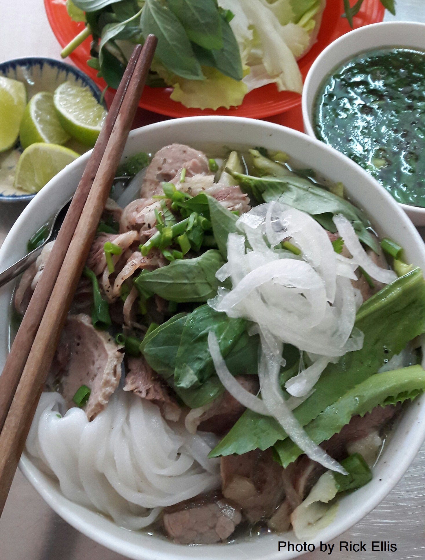 A hearty bowl of pho with the fixings