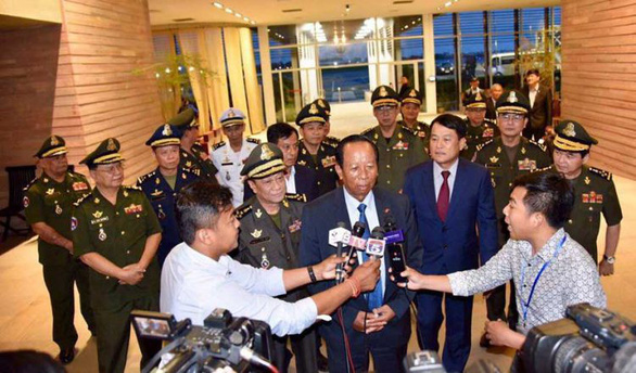 Cambodian Defense Minister General Tea Banh is surrounded by reporters at an airport in Phnom Penh, Cambodia after returning from the 18th Shangri-la Dialogue in Singapore on June 3, 2019. Photo: Facebook