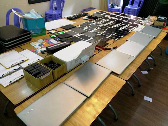 Devices used by the Chinese crime ring to carry out their scam. Photo: Ho Chi Minh City police