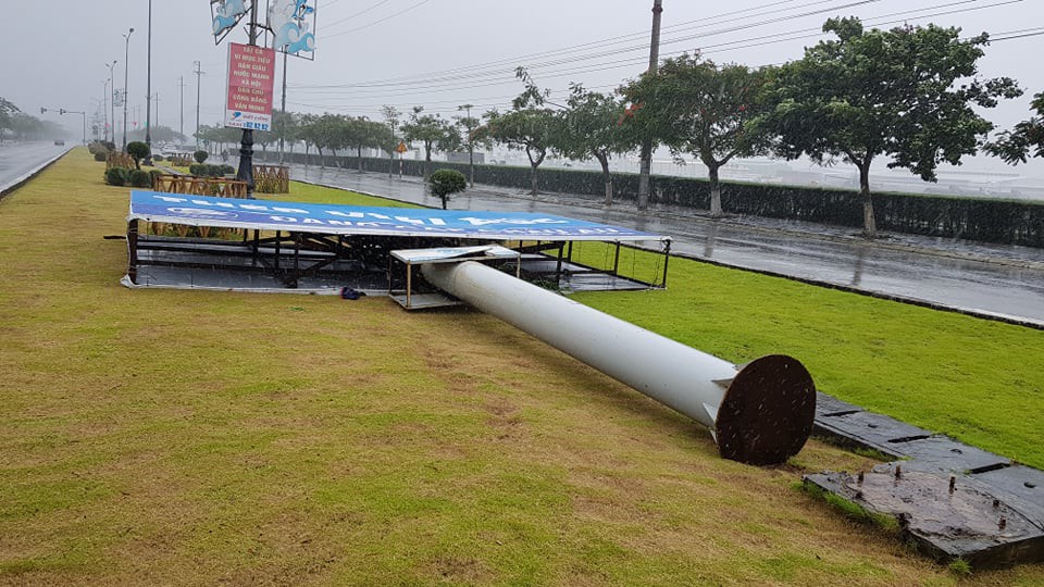 A billboard is knocked down in Hai Phong City. Photo: Tien Thang / Tuoi Tre