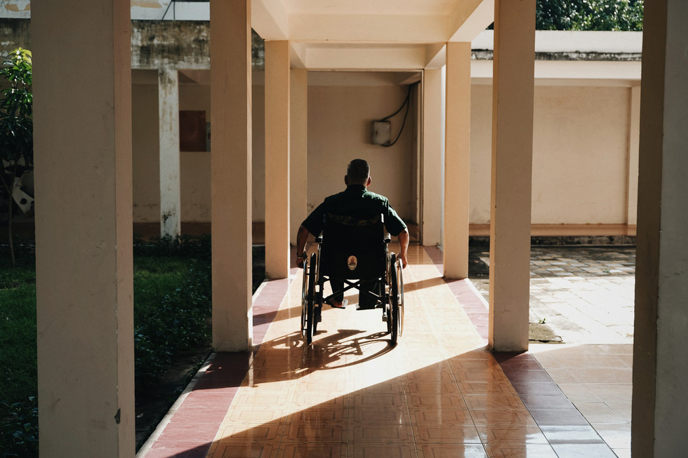 A post-war invalid moves around on a wheelchair at the Long Dat Wounded Soldiers’ Nursing Center located in Ba Ria – Vung Tau Province, southern Vietnam. Photo: Mai Thuong / Tuoi Tre