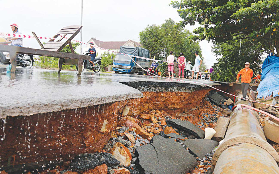 Serious subsidence occurs along a street.