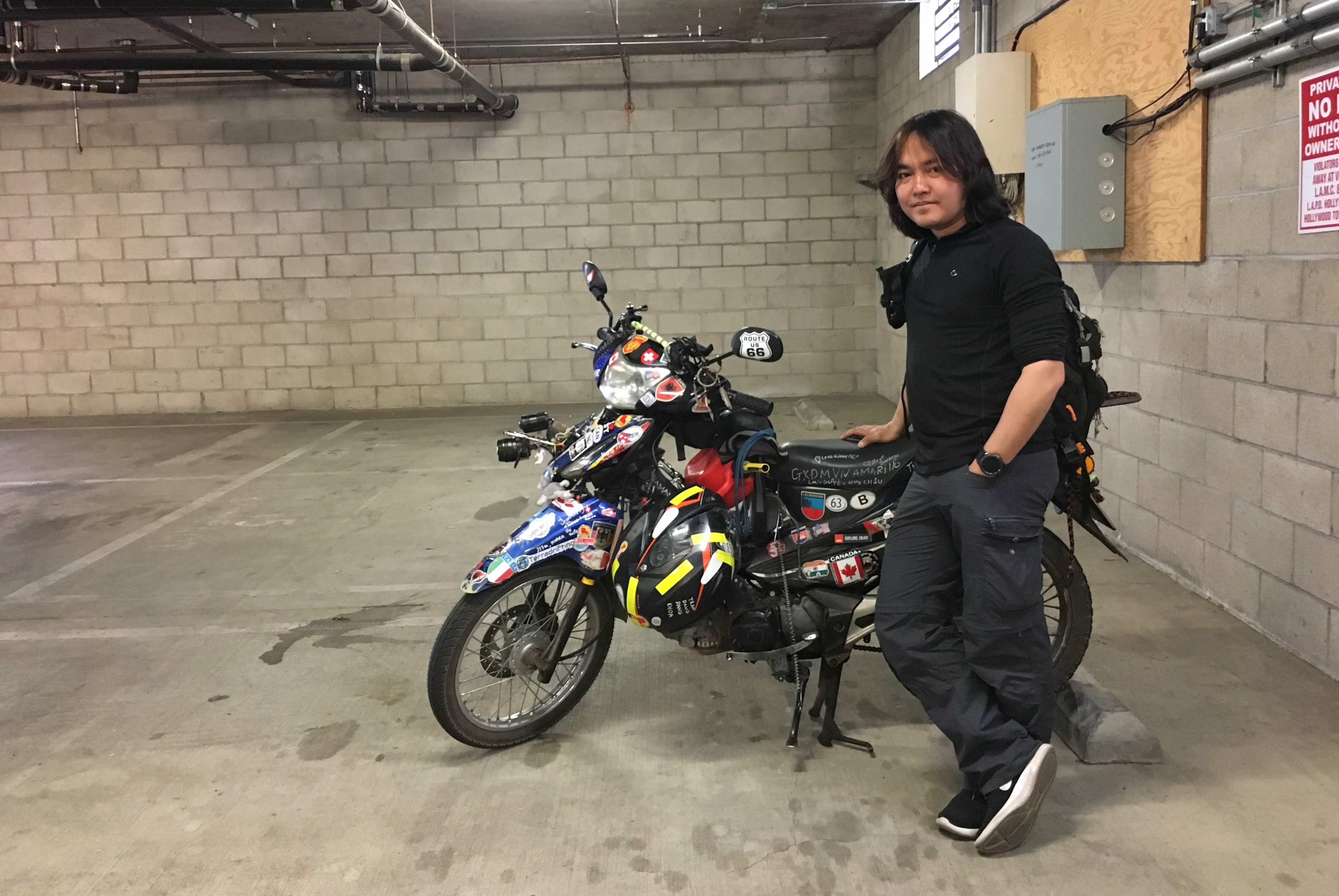 Tran Dang Dang Khoa poses for a photo with his 'The Memo' in the garage at the hotel he stays in Los Angeles. Photo: Dong Nguyen/Tuoi Tre News