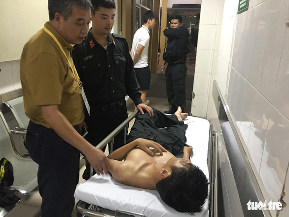 A police officer is hospitalized after a chaos during a V.League 1 game at Hang Day Stadium in Hanoi, September 11, 2019. Photo: Tuoi Tre