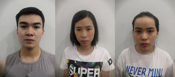 The three Vietnamese suspects are held at the police station.