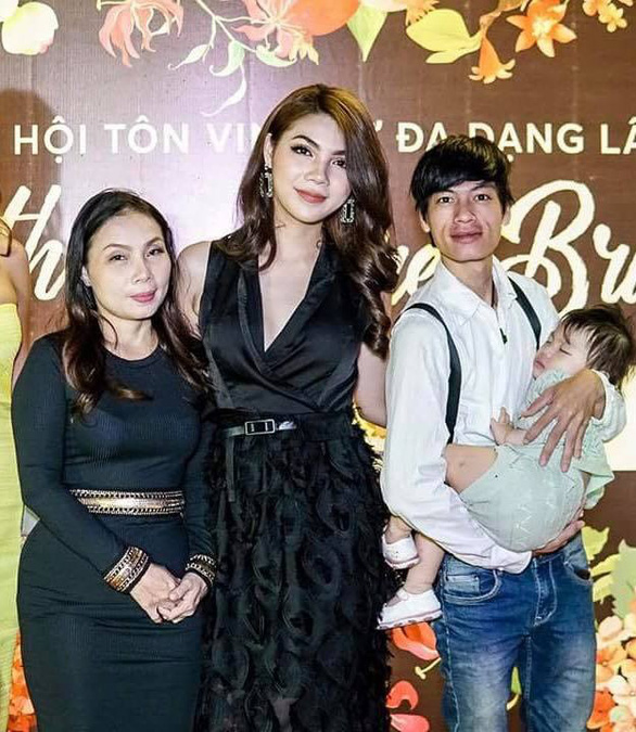 Yen Mi (middle) poses for a photo with her mother, husband and daughter at an event in Ho Chi Minh City. Photo: Supplied