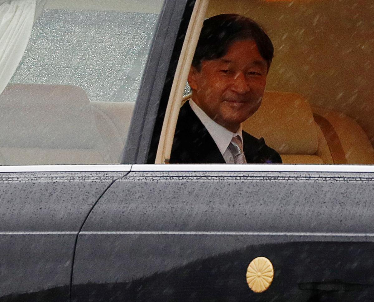 Japan's Emperor Naruhito arrives at the Imperial Palace on the day he is formally enthroned, in Tokyo, Japan October 22, 2019.  REUTERS/Edgar Su