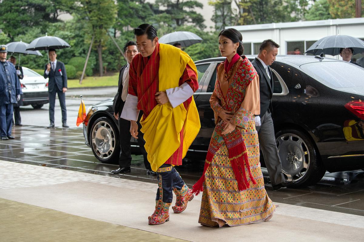 Bhutan's King Jigme Khesar Namgyel Wangchuck and Queen Jetsun Pema arrive for the enthronement ceremony of Japan's Emperor Naruhito at the Imperial Palace in Tokyo, Japan October 22, 2019.  Carl Court/Pool via REUTERS