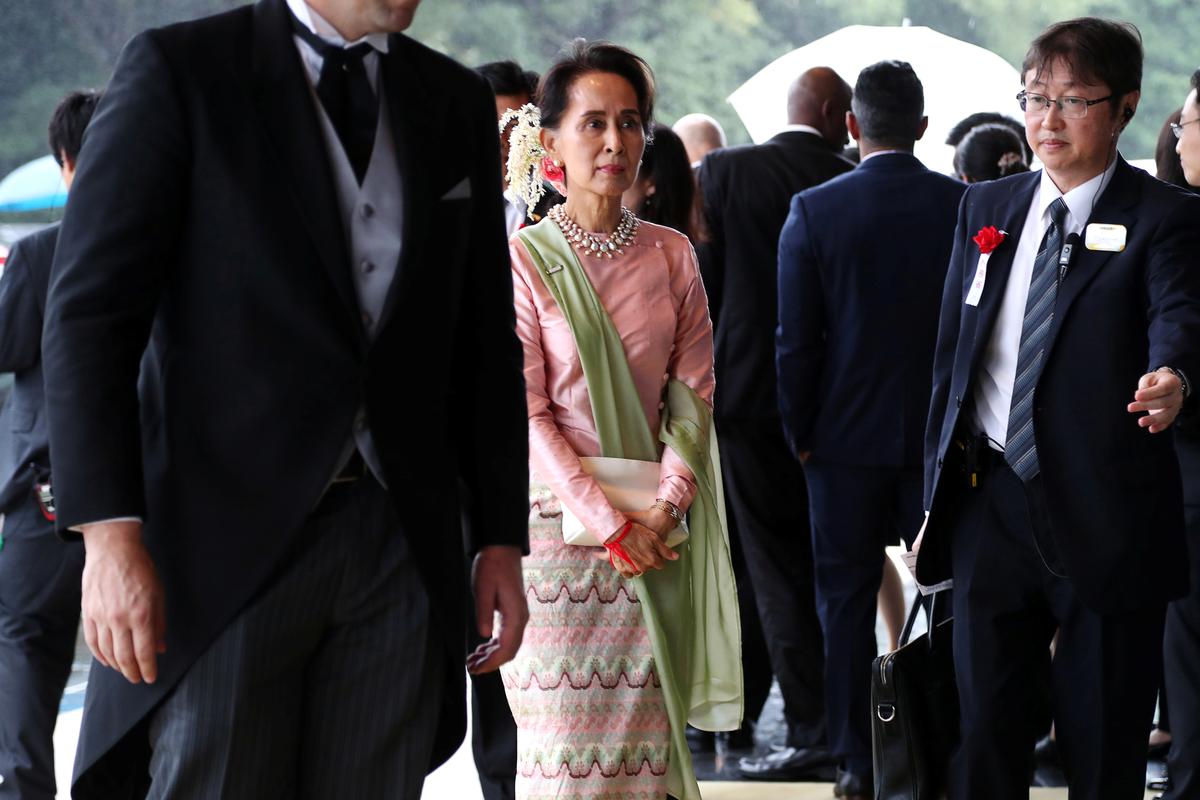 Myanmar's State Counsellor Aung San Suu Kyi arrives at the Imperial Palace to attend the proclamation ceremony of the enthronement of Japan's Emperor Naruhito in Tokyo, Japan, October 22, 2019.  Koji Sasahara/Pool via REUTERS