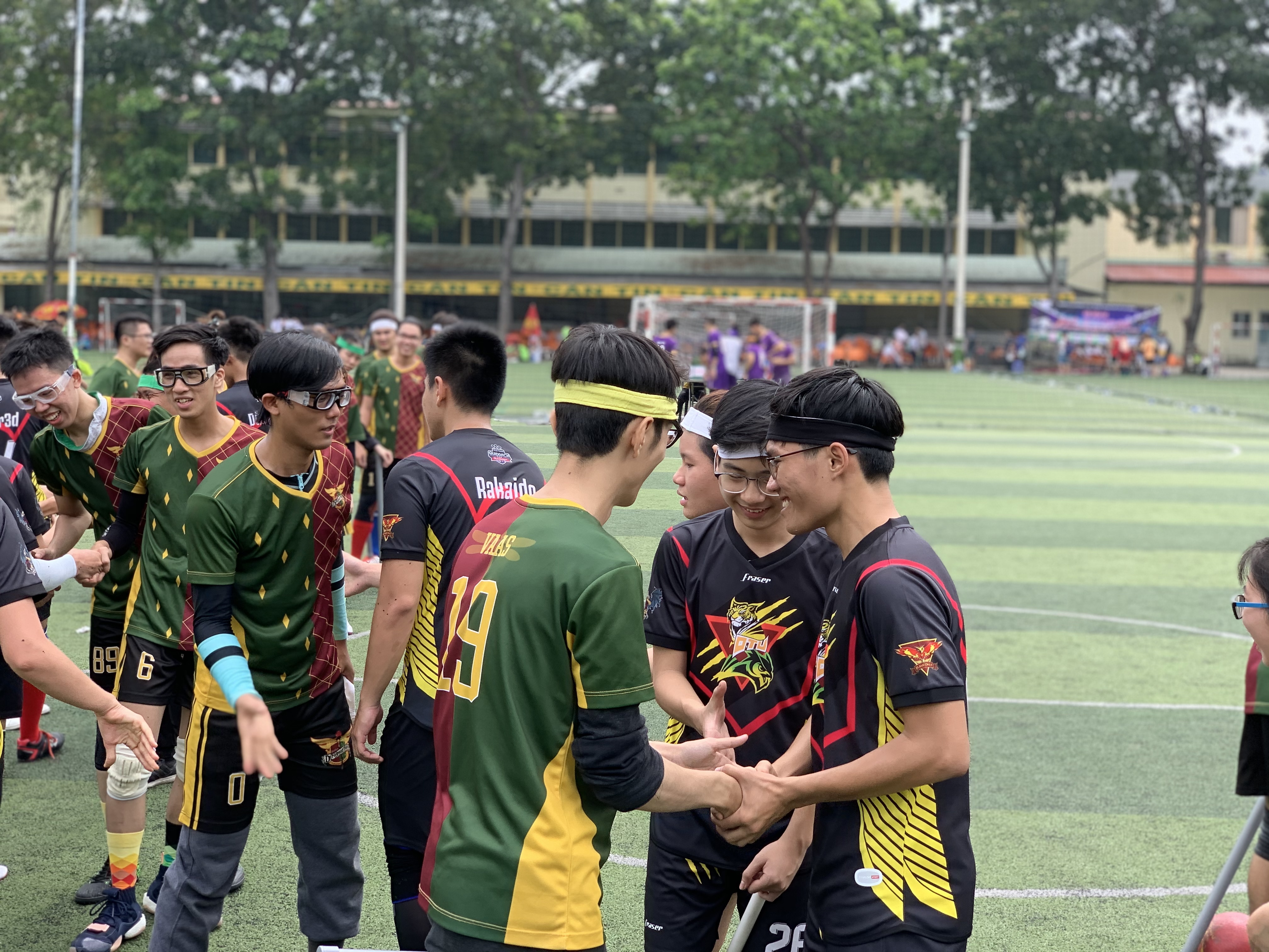Players shake hand after a match in the maiden Vietnam Quidditch Cup organized by the Vietnam Quidditch Association  in Tan Binh District, Ho Chi Minh City, November 10, 2019. Photo: Bao Anh / Tuoi Tre News