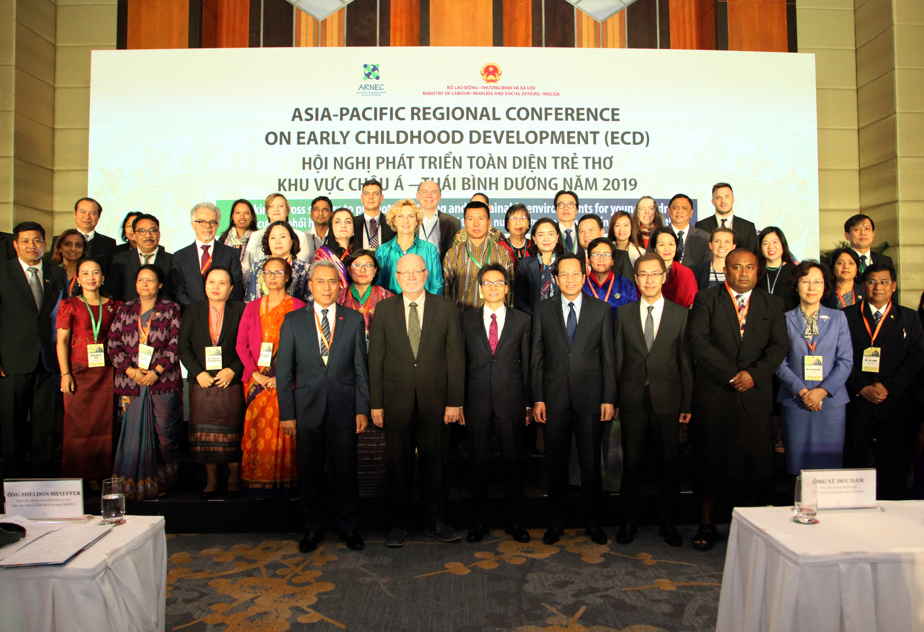 Attendees pose for a group photo at the Asia-Pacific Regional Conference on Early Childhood Development in Hanoi on December 4, 2019 in this supplied photo.