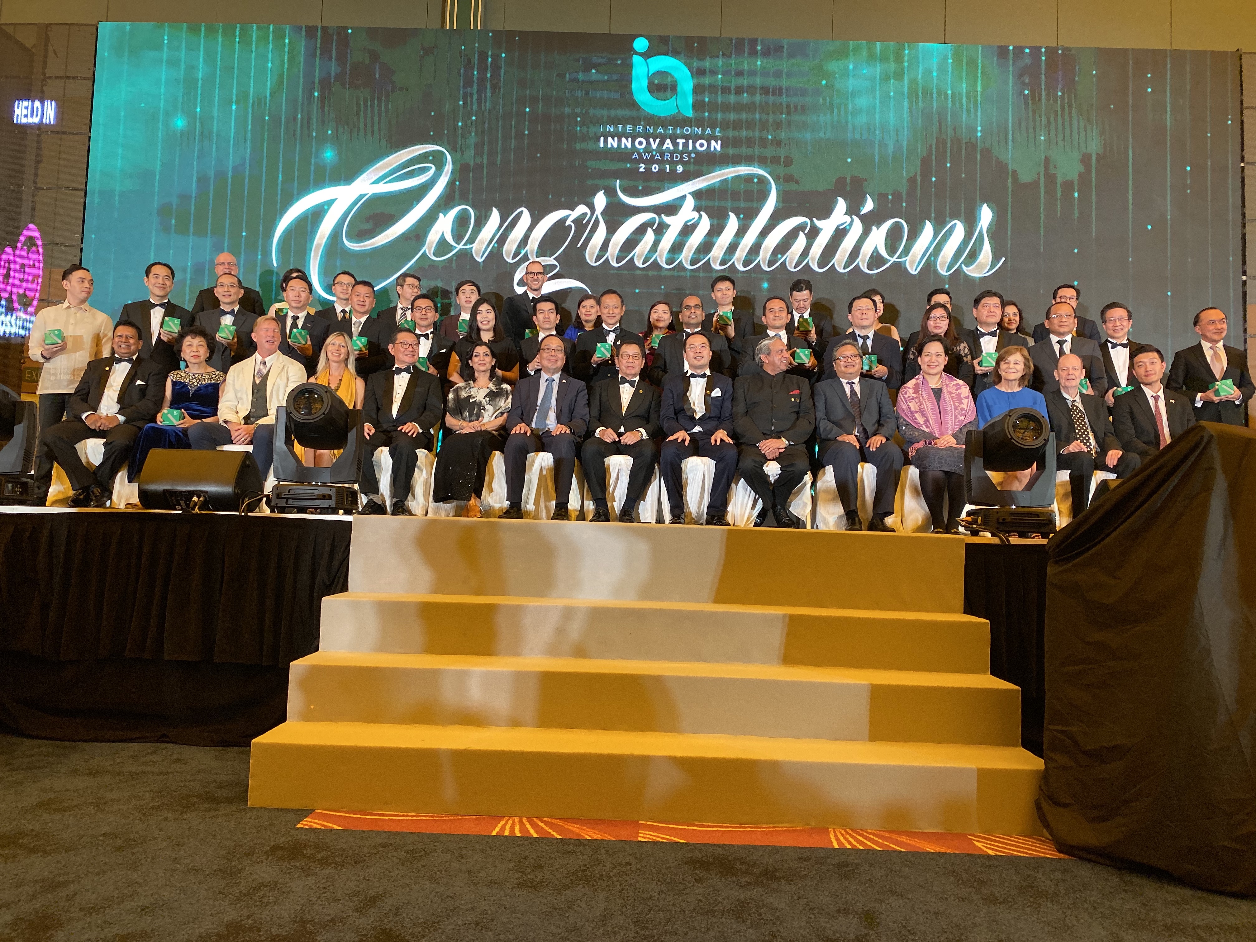 Winners of the International Innovation Awards 2019 take a group photo at a ceremony in Singapore on December 4, 2019. Photo: Minh Huynh / Tuoi Tre