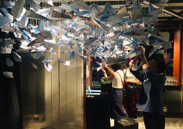 The installation 'Paper planes' on display at the 'You can talk to me' exhibition in Ho Chi Minh City on December 6-14, 2019. Photo: Mai Thuy / Tuoi Tre