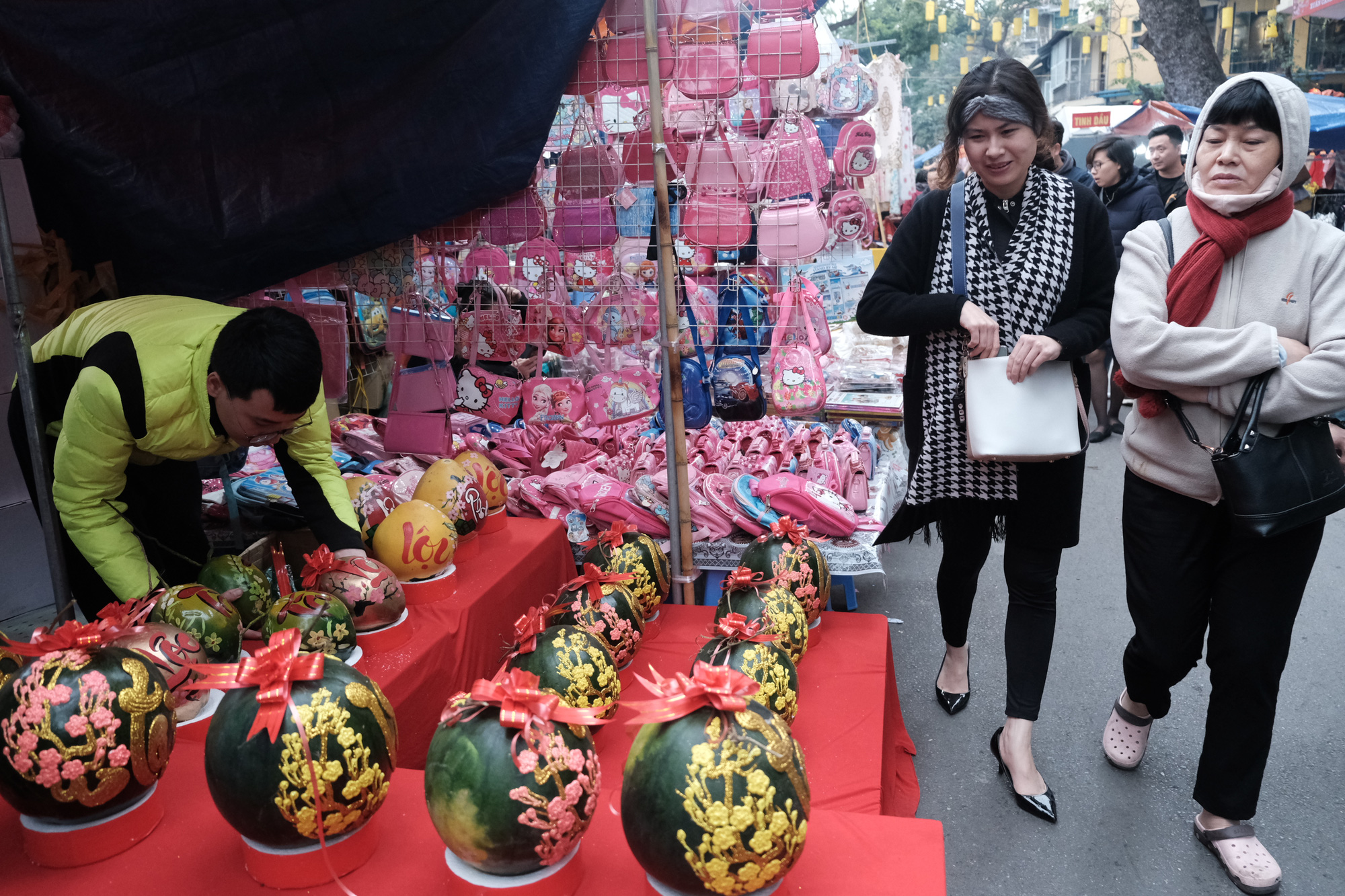 Calligraphic watermelons are sold at the Hang Luoc flower market in Hoan Kiem District, Hanoi. Photo: Mai Thuong / Tuoi Tre