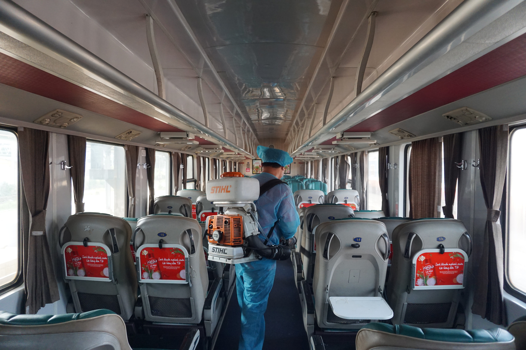 A train is sterilized after arriving at the Saigon Railway Station in District 3, Ho Chi Minh City. Photo: Duc Phu / Tuoi Tre