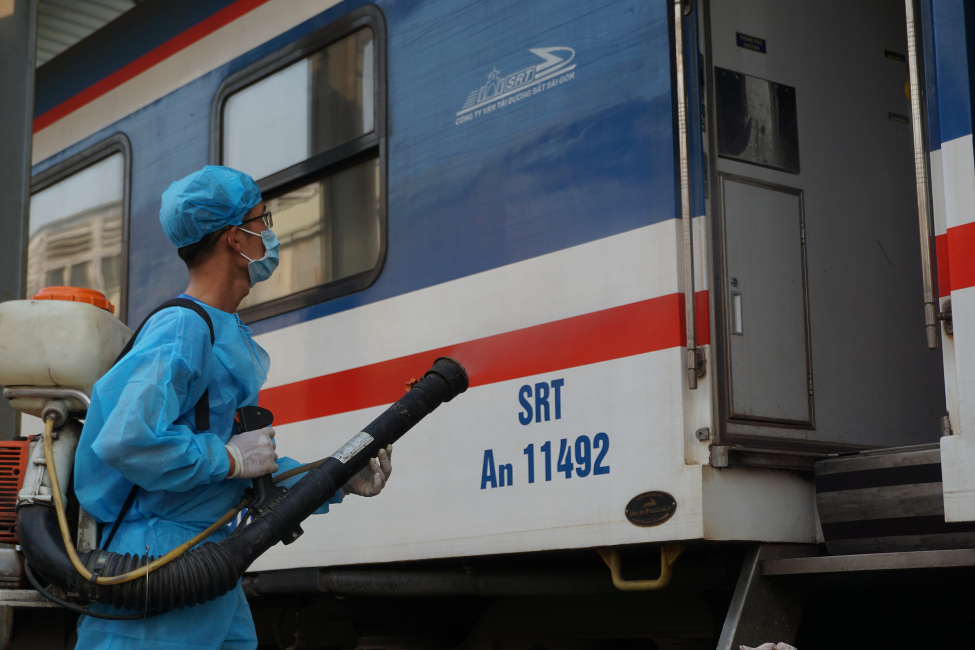 A train is sterilized after arriving at the Saigon Railway Station in District 3, Ho Chi Minh City. Photo: Duc Phu / Tuoi Tre