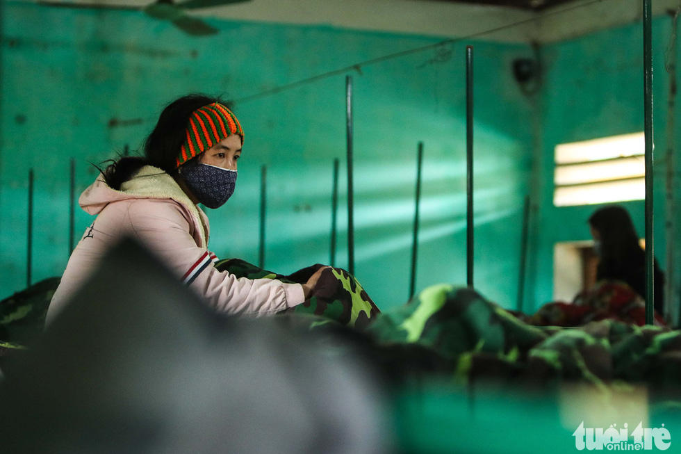 A woman in quarantine for the novel coronavirus at the Military School of Lao Cai Province in northern Vietnam. Photo: Nguyen Khanh / Tuoi Tre