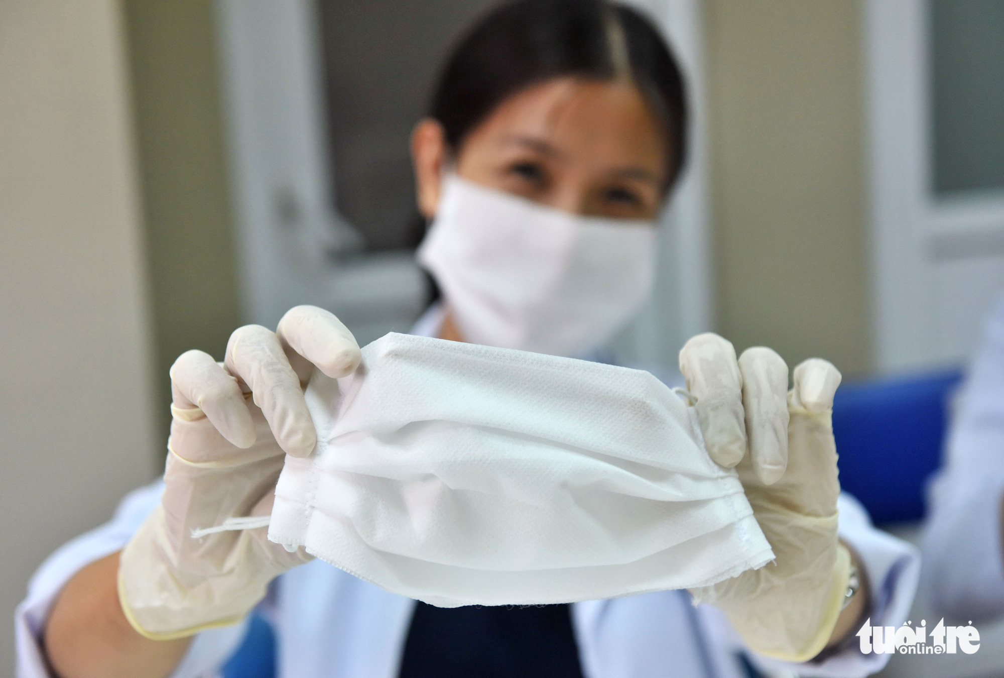 Medical staff make DIY face masks as COVID-19 triggers shortage in Vietnam