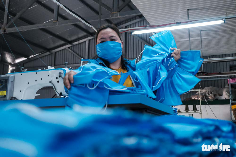 Raincoat factory produces face masks for free amidst COVID-19 epidemic in Vietnam