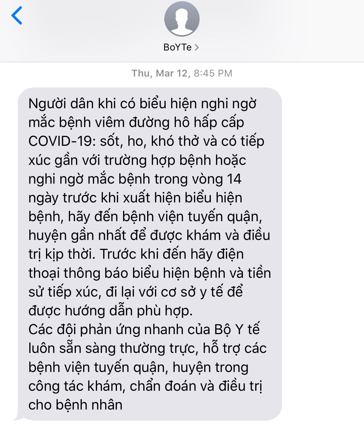 A screenshot shows a message from the Vietnamese Ministry of Health to a citizen, calling people to undergo health check if they have suspicious signs of COVID-19